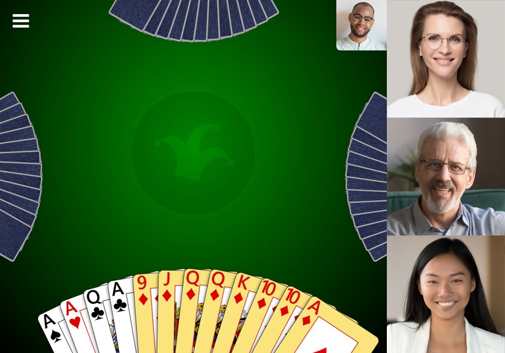 Screenshot of a game of Pinochle in Trickster Cards with video chat enabled. Videos for other players are displayed to the right of the game. A video preview for the local player is displayed near the top right.